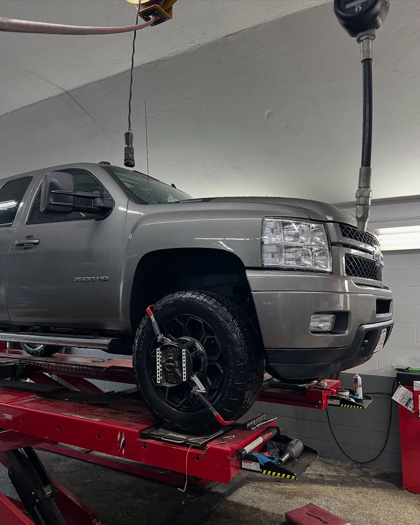 truck on lift front end alignment-squeezed