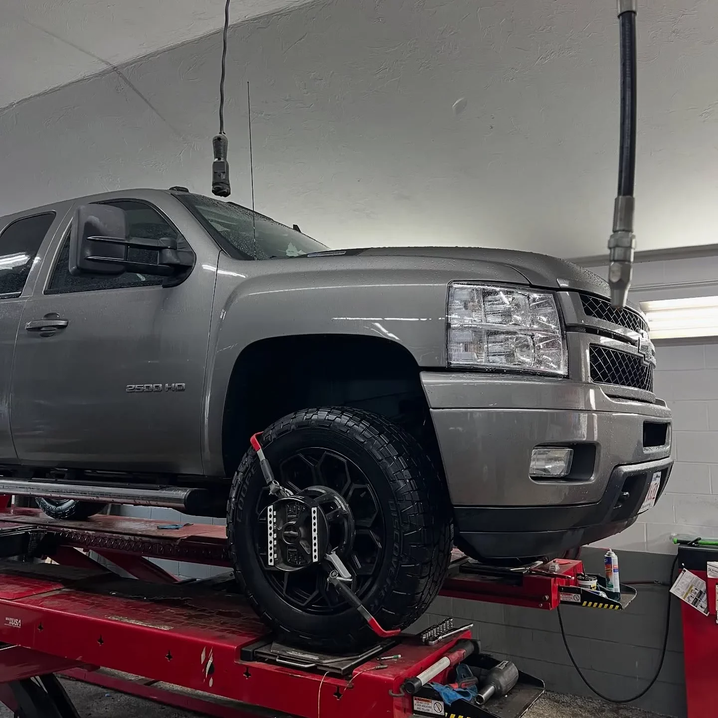 truck on lift front end alignment-squeezed